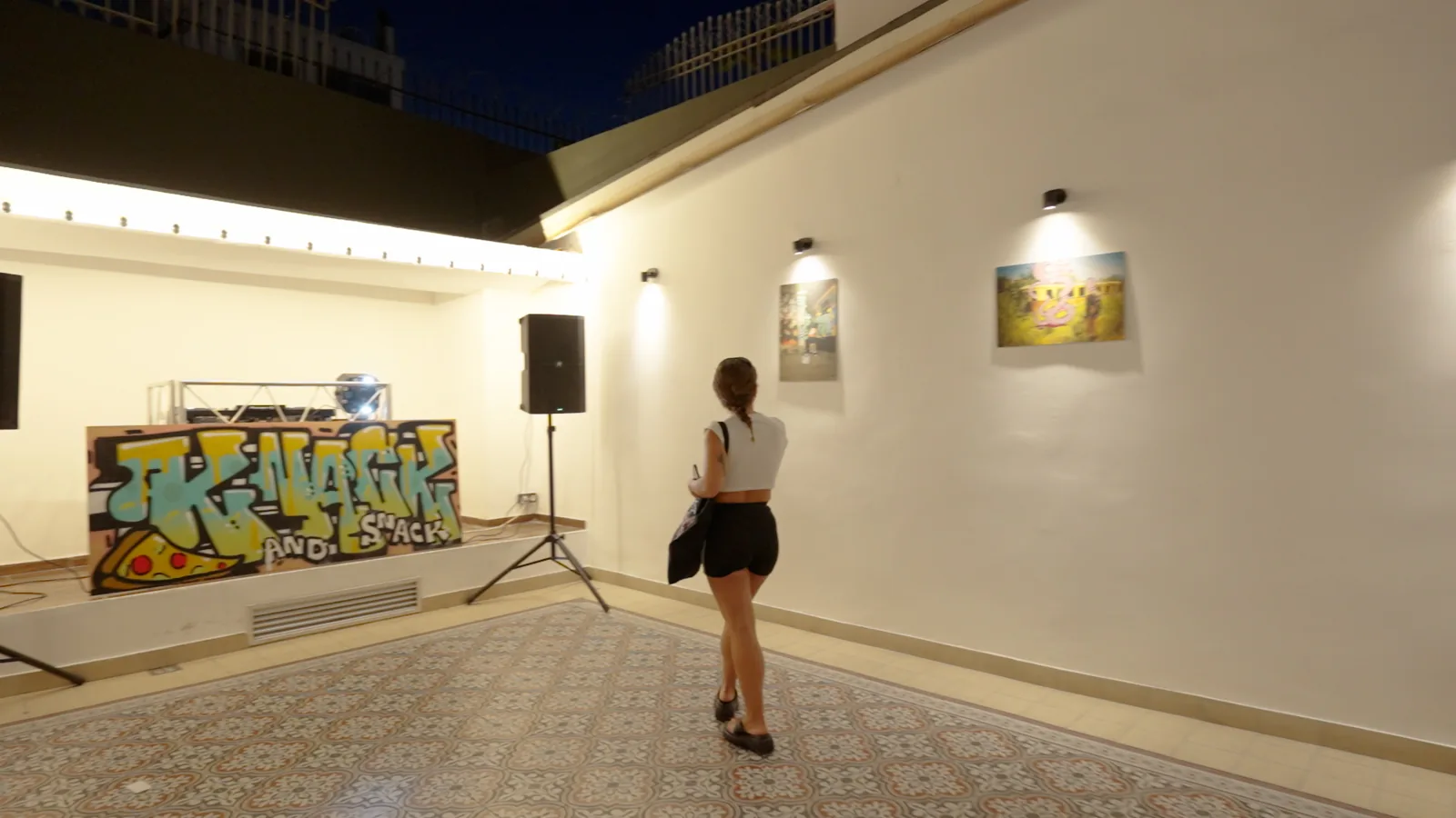 The Knack & Snack gallery floor at night
