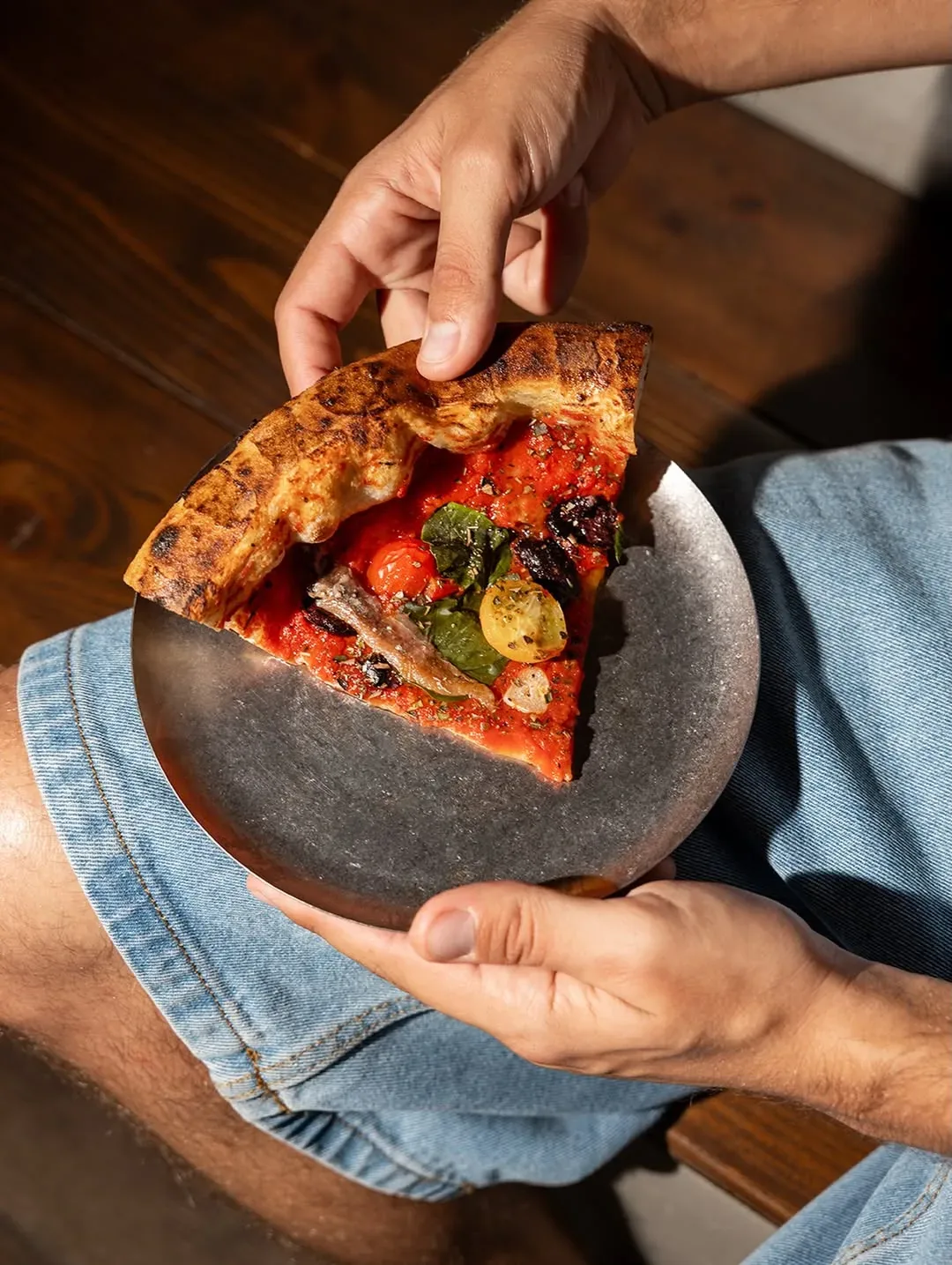 A slice of Knack & Snack pizza